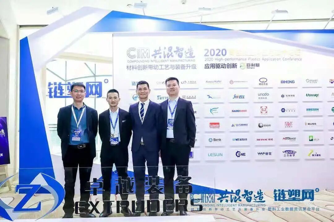 Global shipping containers stacked at a port terminal representing international competition faced by Plastic Extrusion Manuf