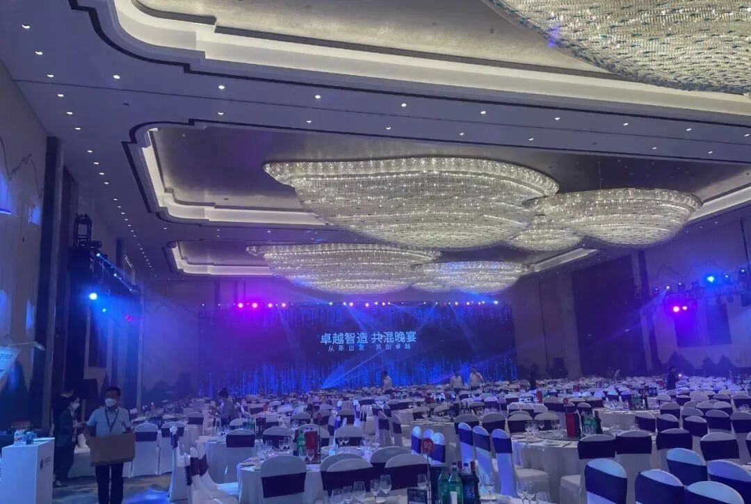 Shipping containers stacked at a busy international port terminal representing global logistics for extrusion plastic manufac