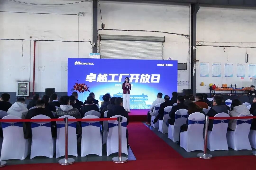Engineer monitoring industrial control panel in a modern plastics manufacturing plant