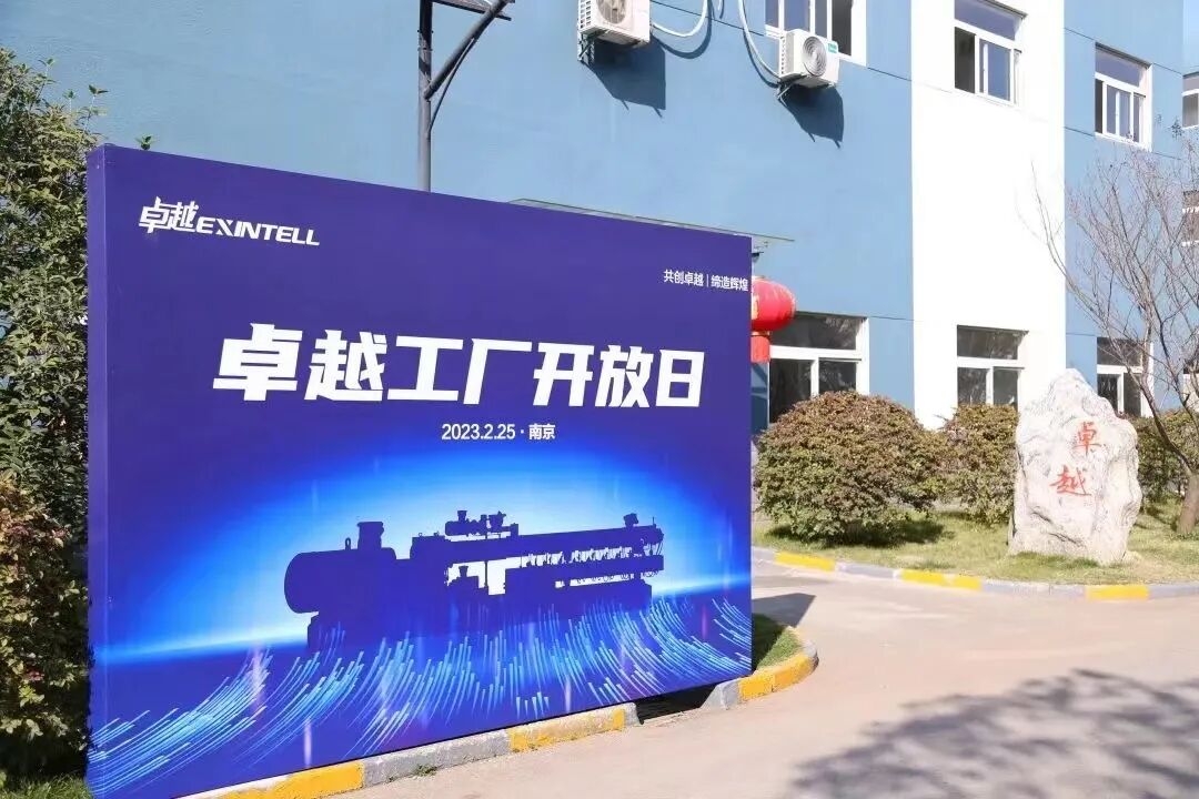 Aerial view of a major international shipping port with container vessels and logistics infrastructure