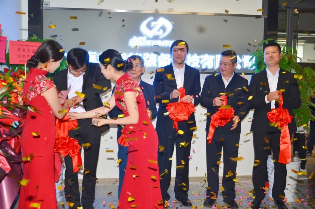 Engineers working with advanced industrial control systems and automation technology in a modern manufacturing plant