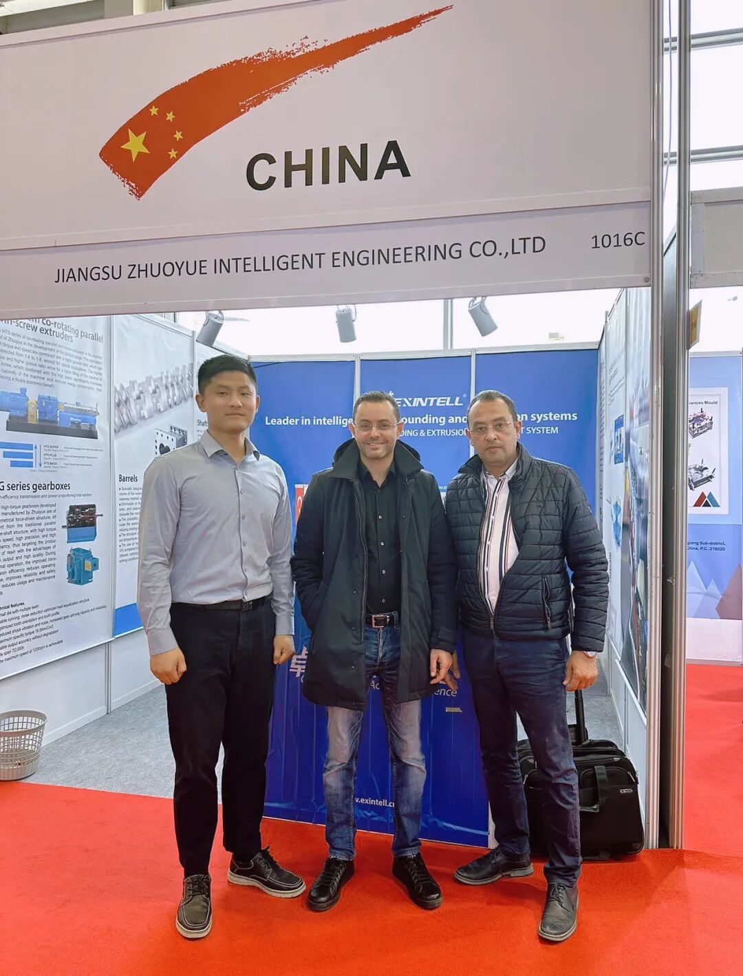 Industrial manufacturing facility with heavy machinery and extrusion production lines representing filler masterbatch extrusi