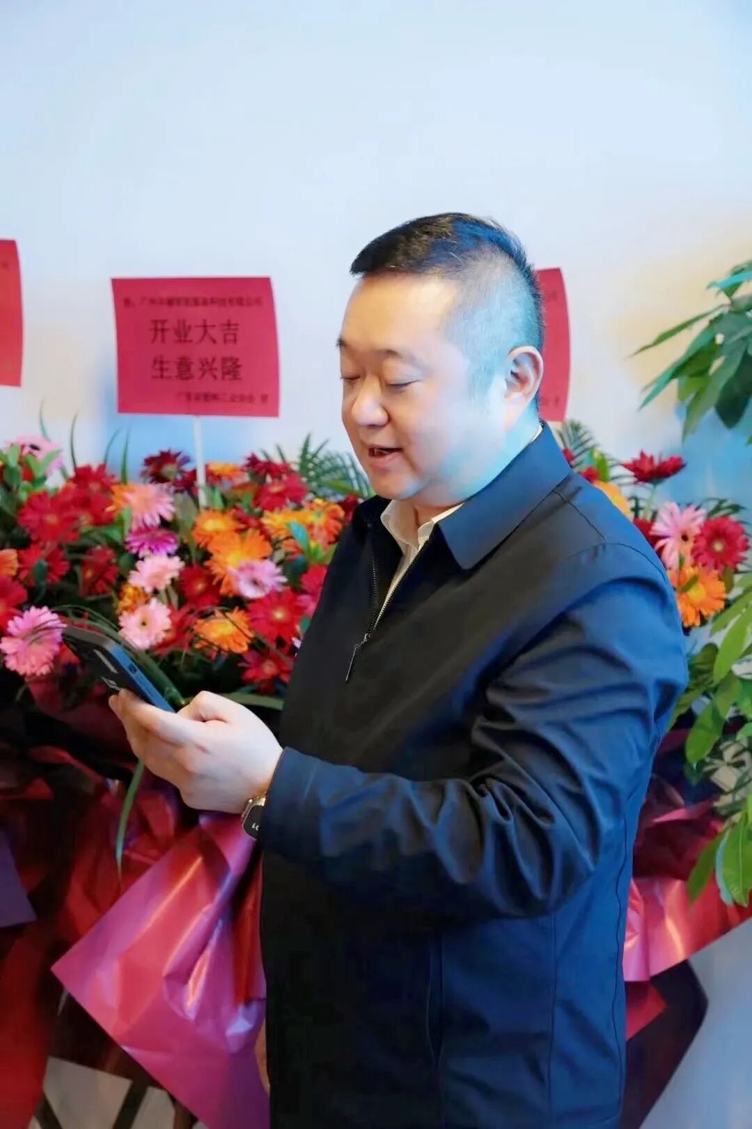 Aerial view of a major international port with shipping containers and logistics infrastructure supporting global trade
