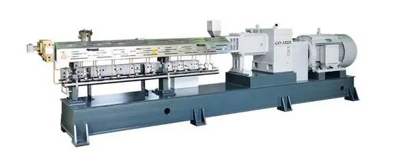 International B2B trade exhibition hall with industrial machinery displays and business professionals networking