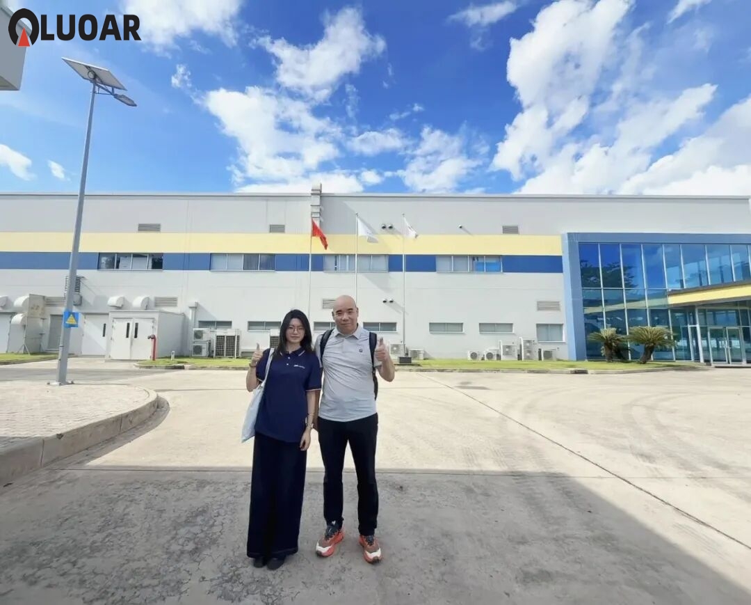 Industrial manufacturing facility with heavy machinery representing twin screw extruder production environment