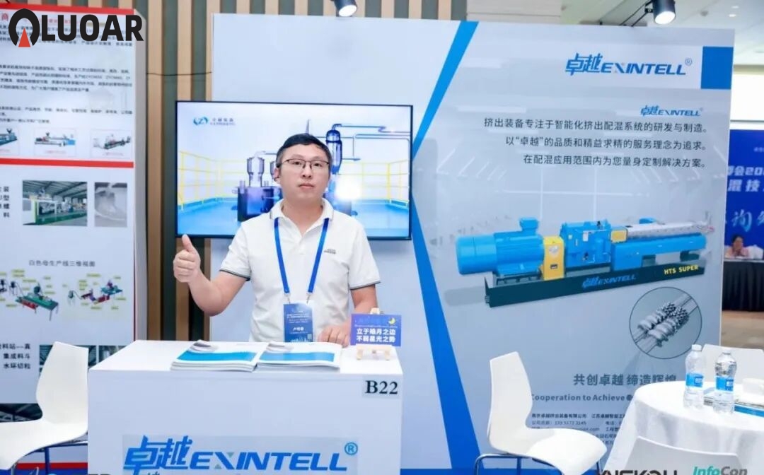 Industrial manufacturing facility with heavy machinery representing parallel twin-screw extruder production lines