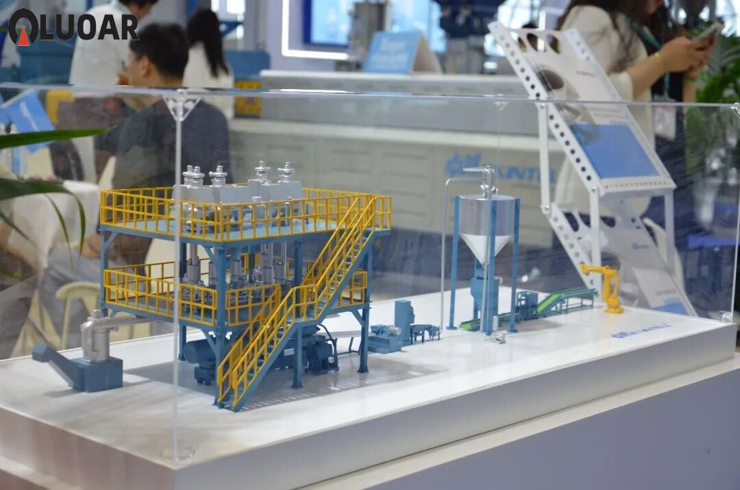 Engineer inspecting industrial machinery in a modern manufacturing facility with precision equipment