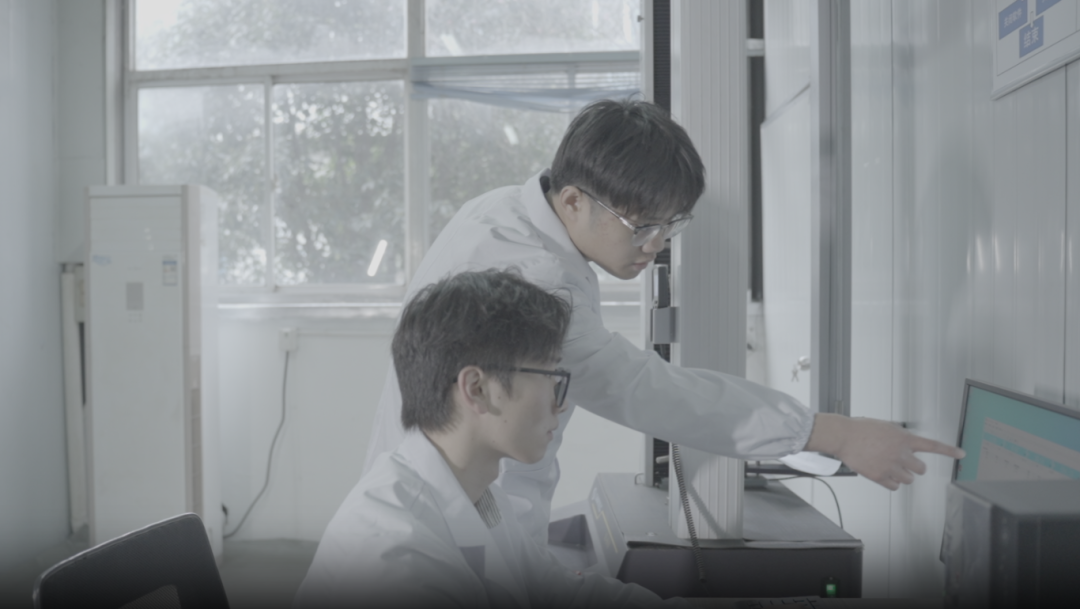 Business professionals analyzing trade data and market forecasts on digital screens in a modern conference room setting