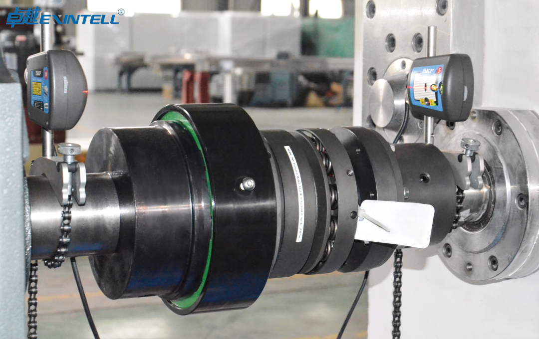 Color, black, and filler masterbatch pellets alongside the extruder lines that produce them