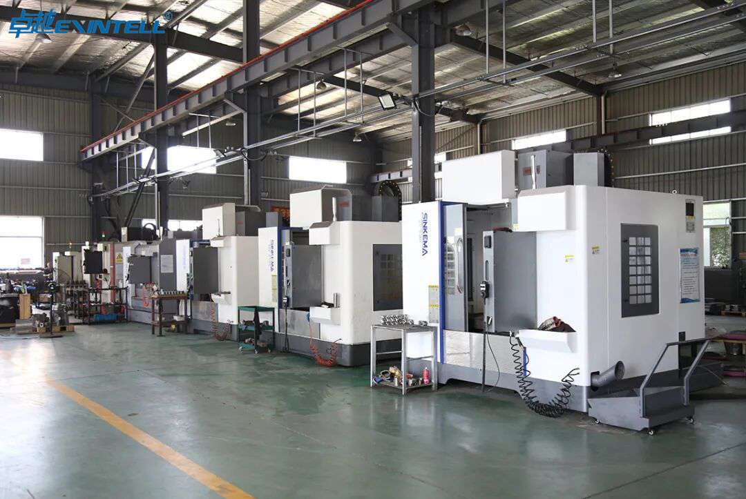 Rows of industrial plastic extruders on a manufacturer factory floor