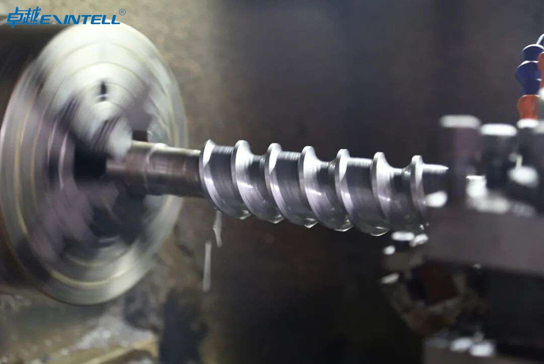 Industrial plastic extrusion production line with barrel, screw drive, and control panel