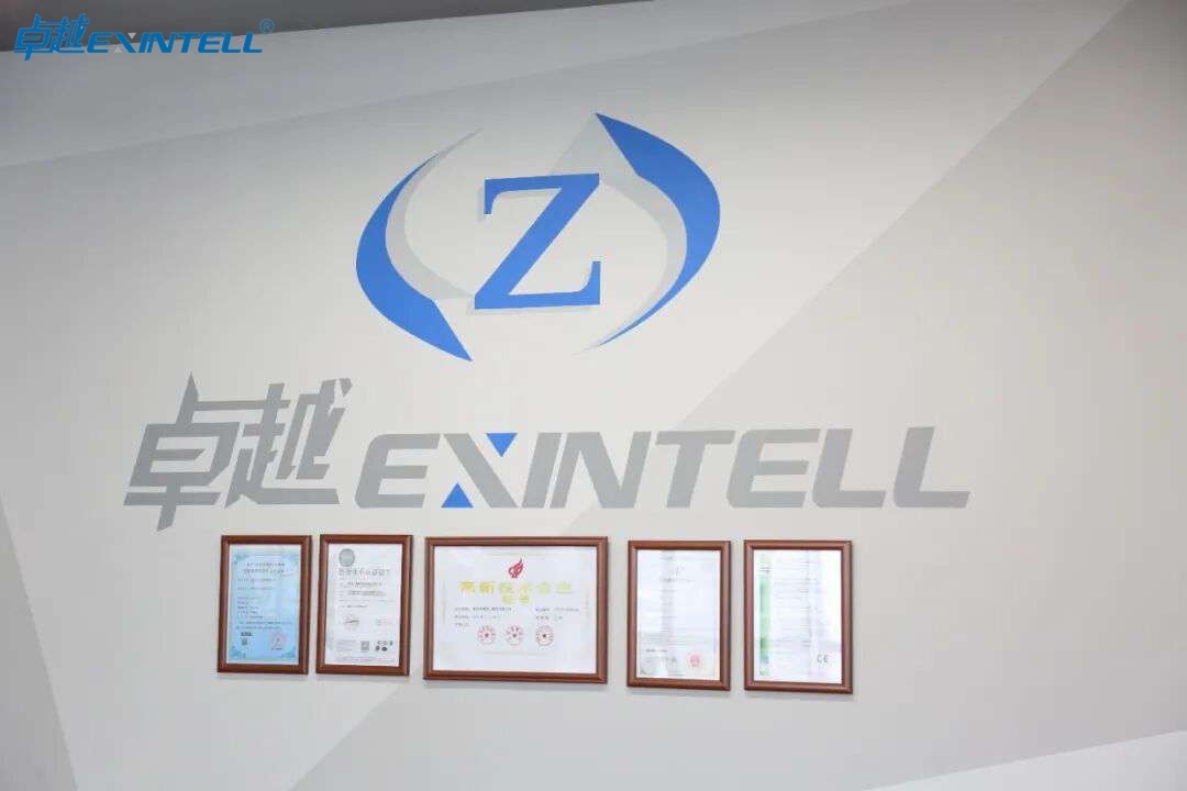 Comparison of stock extruded plastic shapes beside a custom-profiled extrusion part